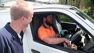 two plumbers in Tacoma heading off to a job in Kent